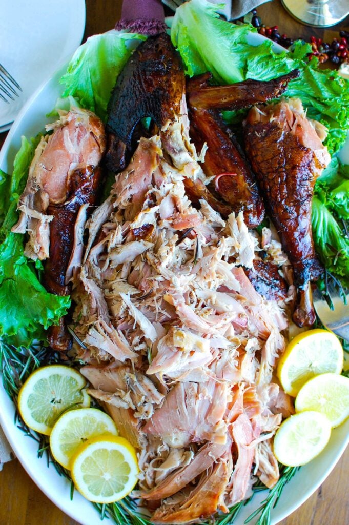 This Smoked Turkey recipe uses simple ingredients. Turkey is slowly smoked creating a crispy skin, tender inside and tons of flavor. If you are looking for a fun, new way to cook your Thanksgiving or Christmas turkey, look no further!