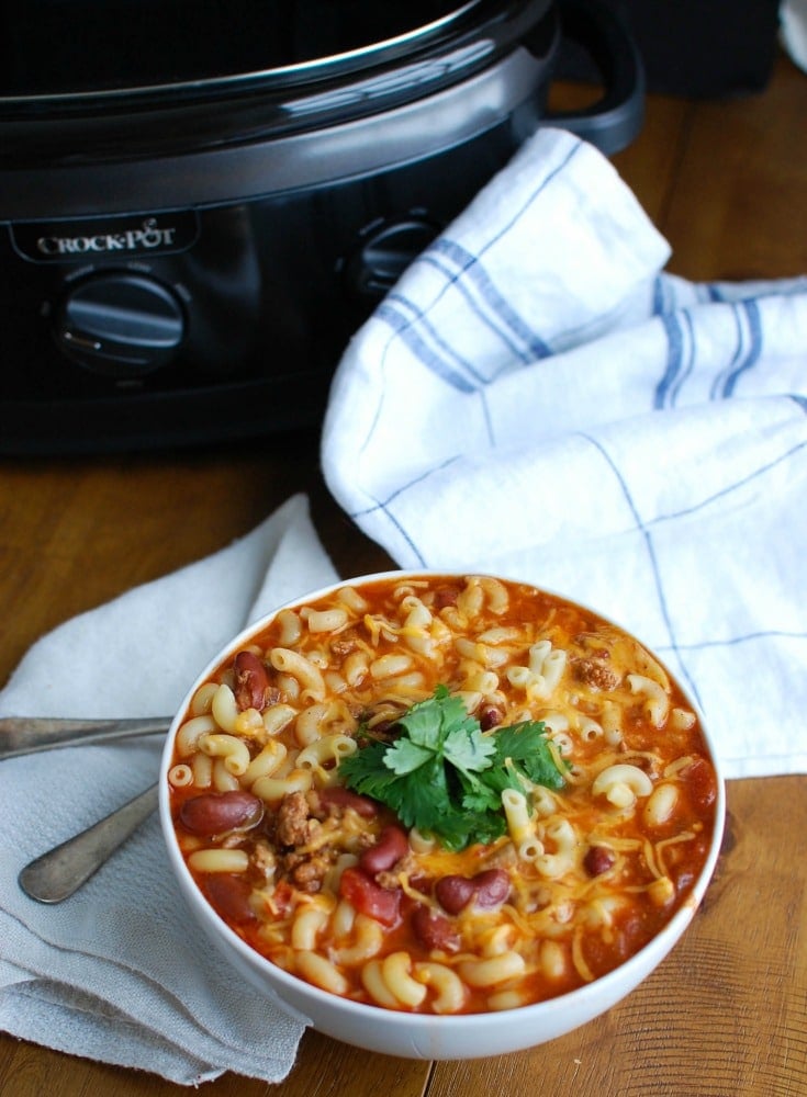 Crock-Pot® Turkey Chili Mac and Cheese is the ultimate cold weather comfort food, perfect for dinner or game day. Turkey Chili is slowly simmers in a Crock-Pot® and then pasta and cheese are mixed in when it is ready to eat. This is a family favorite! 