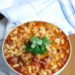 Crock-Pot® Turkey Chili Mac and Cheese is the ultimate cold weather comfort food, perfect for dinner or game day. Turkey Chili is slowly simmers in a Crock-Pot® and then pasta and cheese are mixed in when it is ready to eat. This is a family favorite!