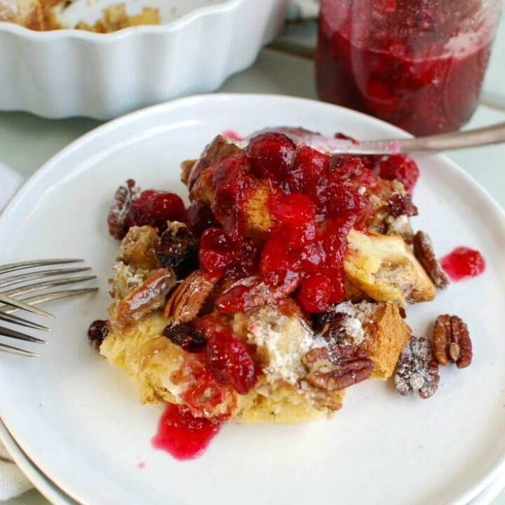 Wake up on Christmas morning to the sweet smell of Overnight Eggnog French Toast Bake with Cranberry Maple Syrup. This is a family favorite during the holidays!