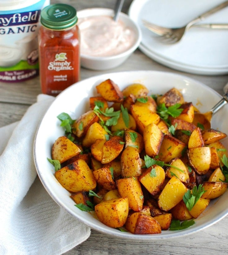 My favorite thing about these potatoes is the smoked paprika. I love the smoky flavor that roasting the potatoes brings out. Once you roast these potatoes and they are nice and crispy I like to sprinkle some fresh parsley on top and serve them warm with the dipping sauce. These are always a huge hit with guests and my family goes crazy for them.