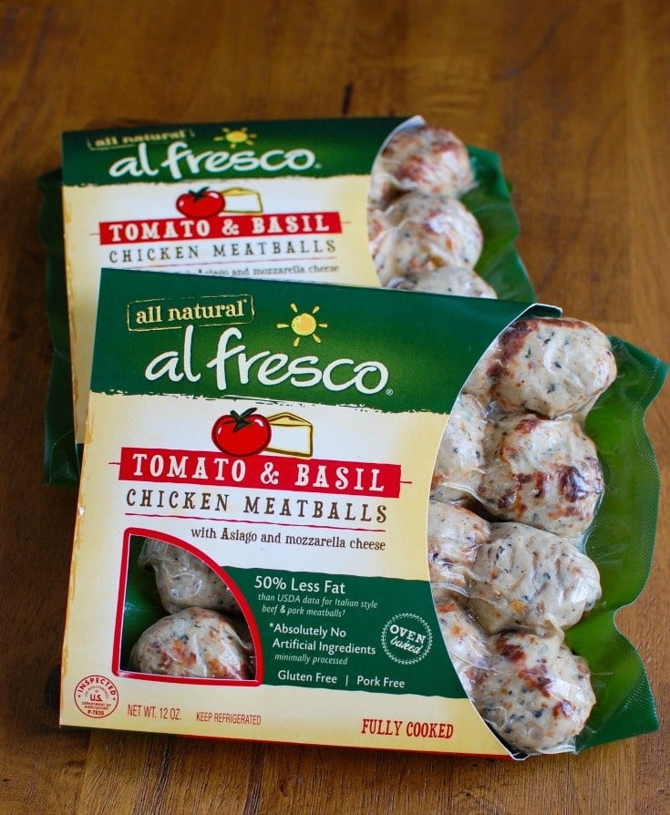 This Skillet Tomato Basil Meatballs is warm, cheesy and the perfect appetizer for a party, game day or for your family to enjoy. Tomato basil meatballs are cooked in a rich tomato sauce and topped with gooey, warm cheese and fresh basil. Pair it with warm baguette to create the perfect bite sized appetizer! 