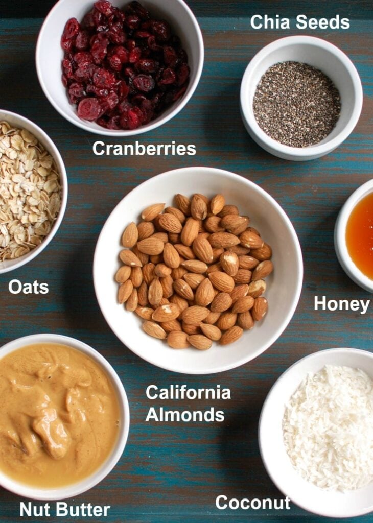 Cranberry Almond Energy Bites are a no-bake energy bite that are easy to make and even easier to throw in your bag for a quick, healthy snack or treat. Oats, chopped almonds, dried cranberries, almond butter, honey, chia seeds and cinnamon are mixed together to create a sweet, delicious bite. 
