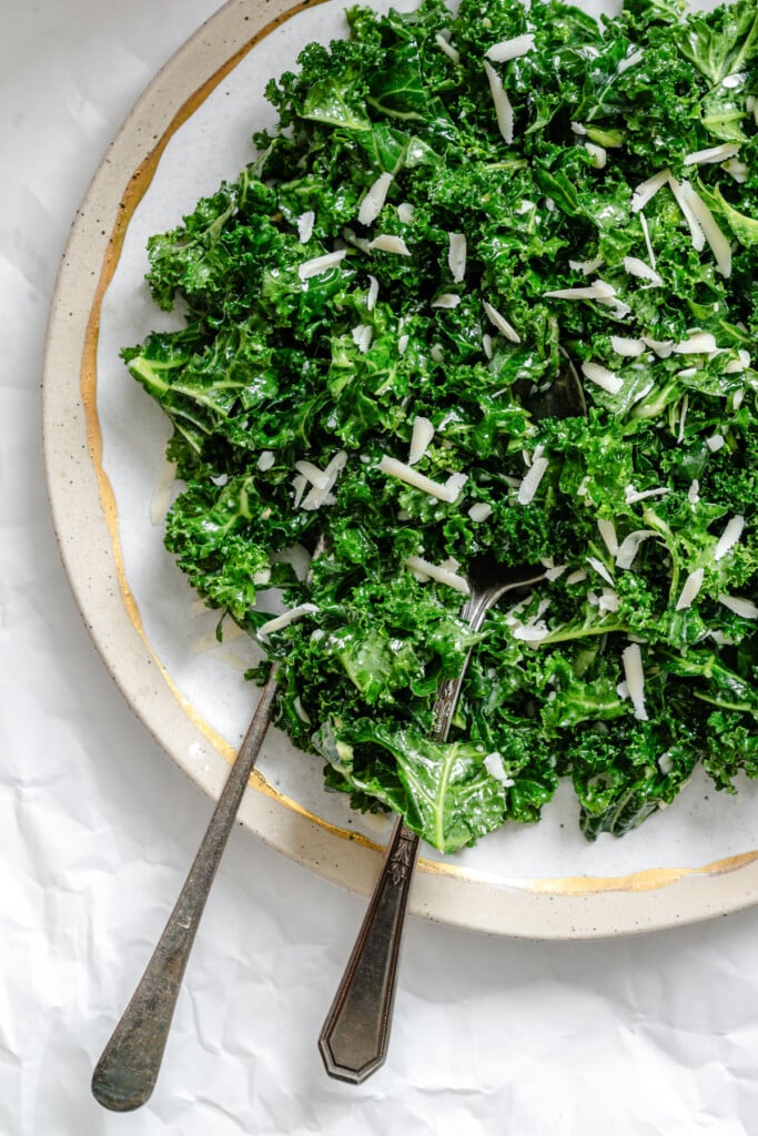 Kale Salad with Lemon Dressing on a white plate