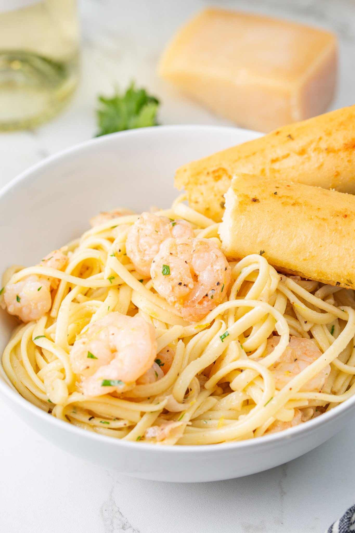 Lemon Garlic Shrimp Pasta with breadstick. 