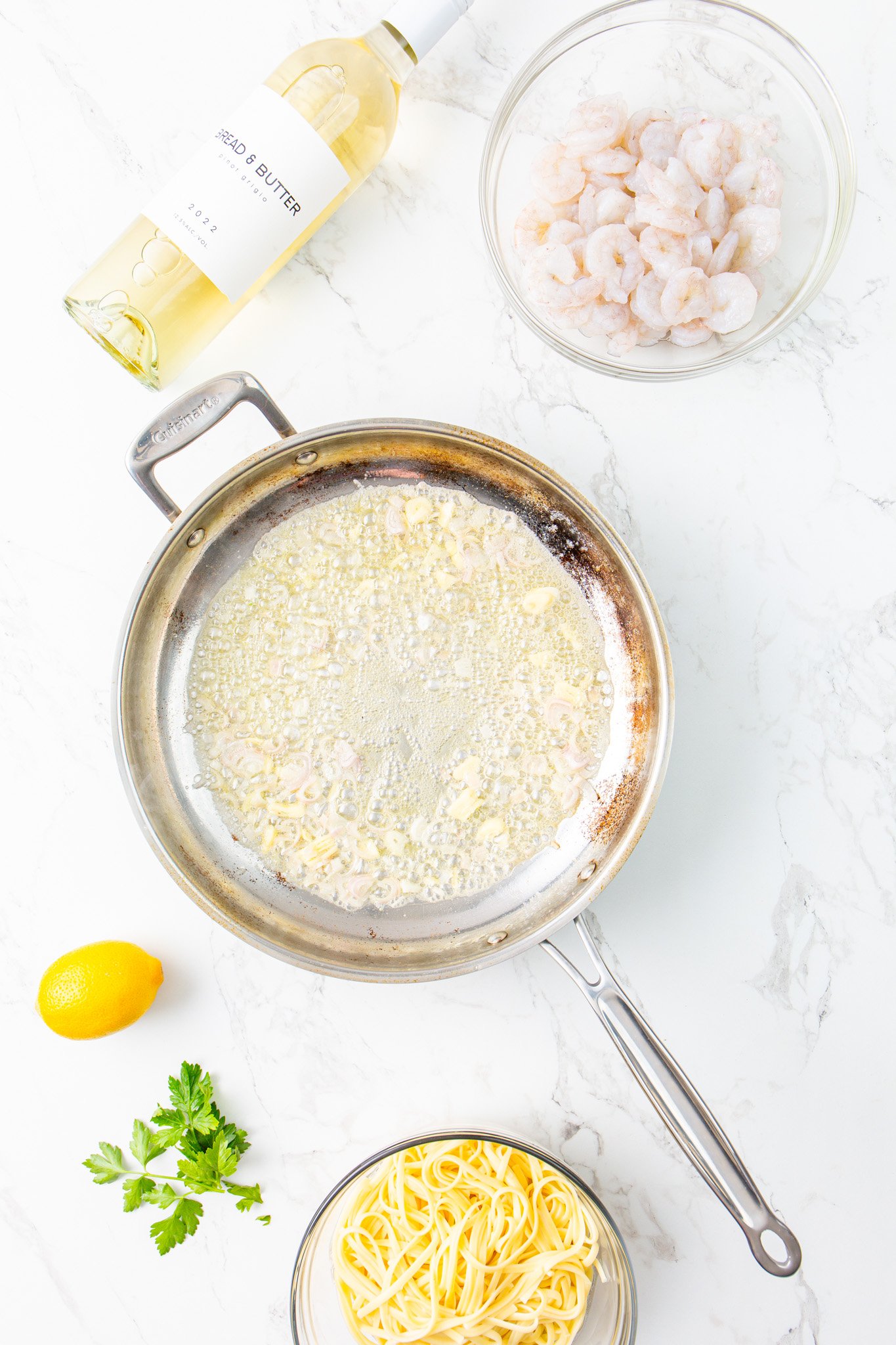 Lemon Garlic Shrimp Pasta onion in skillet. 