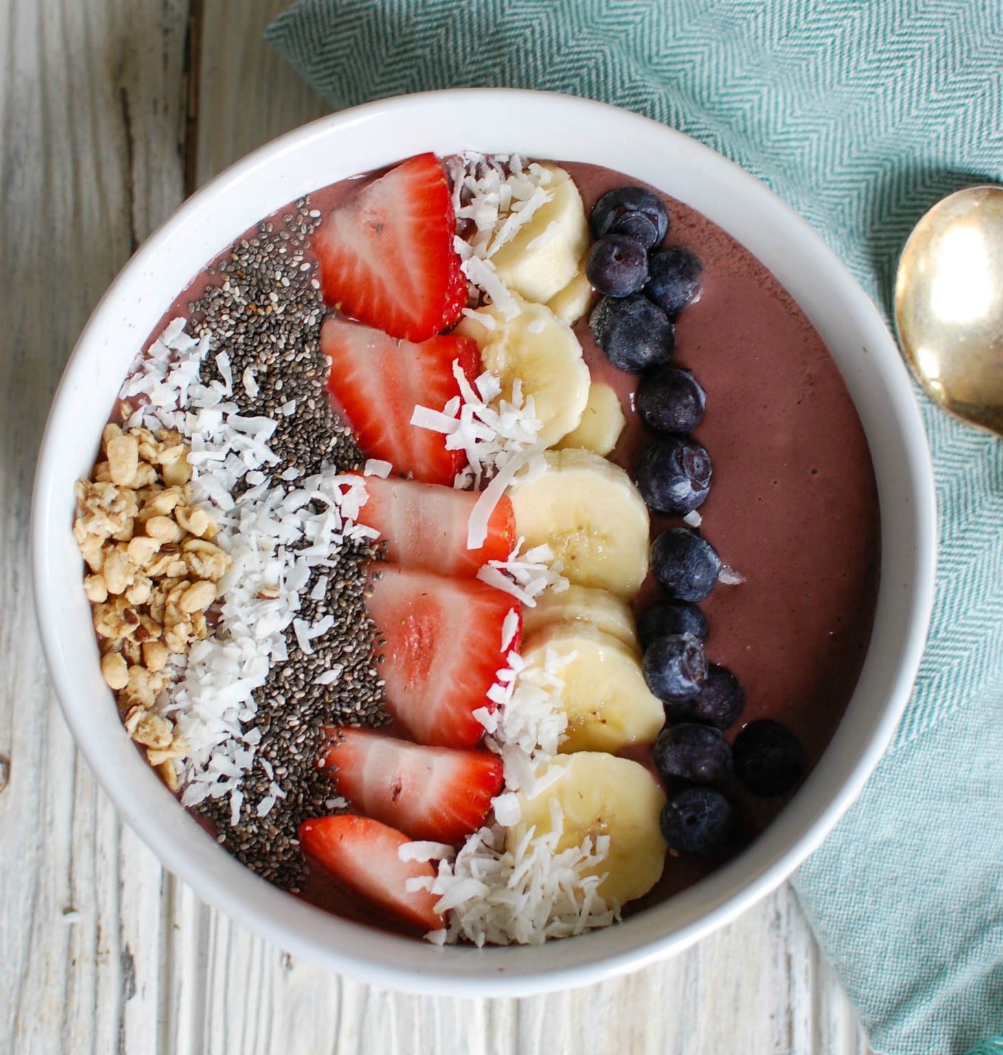 Chia Seeds Fruit Bowl with spoon and napkin.