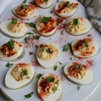 Southwestern Greek Yogurt Deviled Eggs are a healthy take on classic deviled eggs with a Southwestern twist. These deviled eggs use plain whole milk Greek yogurt in place of traditional mayonnaise for a healthy swap. Deviled eggs make a nice appetizer or finger food at a party, but also a great dish to bring to a summer pot-luck.
