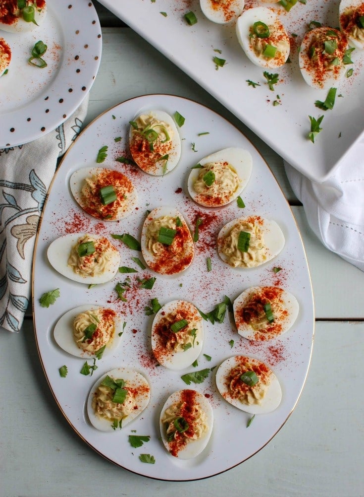 Southwestern Greek Yogurt Deviled Eggs are a healthy take on classic deviled eggs with a Southwestern twist. These deviled eggs use plain whole milk Greek yogurt in place of traditional mayonnaise for a healthy swap. Deviled eggs make a nice appetizer or finger food at a party, but also a great dish to bring to a summer pot-luck. 