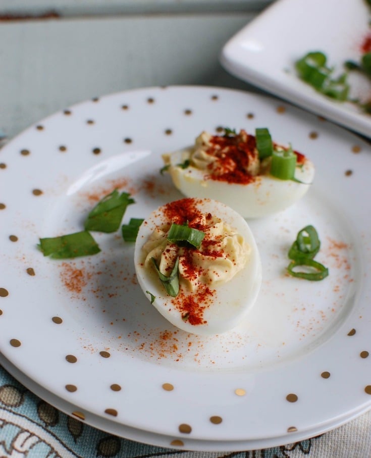 Southwestern Greek Yogurt Deviled Eggs are a healthy take on classic deviled eggs with a Southwestern twist. These deviled eggs use plain whole milk Greek yogurt in place of traditional mayonnaise for a healthy swap. Deviled eggs make a nice appetizer or finger food at a party, but also a great dish to bring to a summer pot-luck.