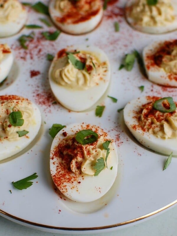 Southwestern Greek Yogurt Deviled Eggs are a healthy take on classic deviled eggs with a Southwestern twist. These deviled eggs use plain whole milk Greek yogurt in place of traditional mayonnaise for a healthy swap. Deviled eggs make a nice appetizer or finger food at a party, but also a great dish to bring to a summer pot-luck.