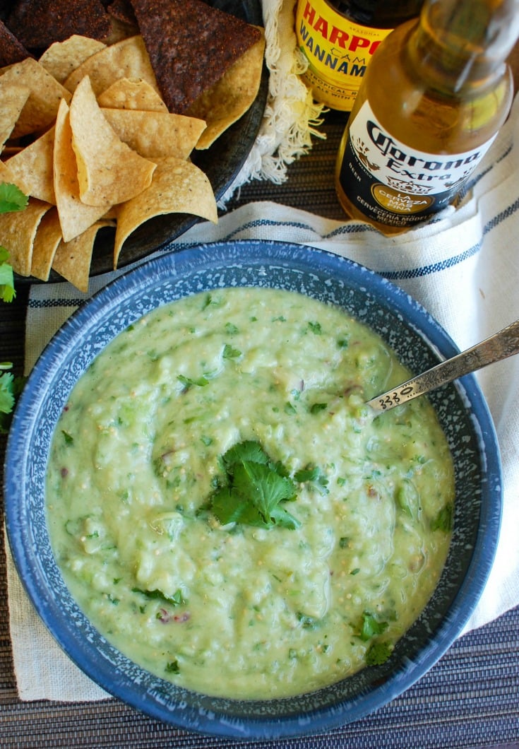 Avocado Tomatillo Salsa is a sweet and spicy salsa that is perfect for dipping. Use it on tacos, burgers and more!