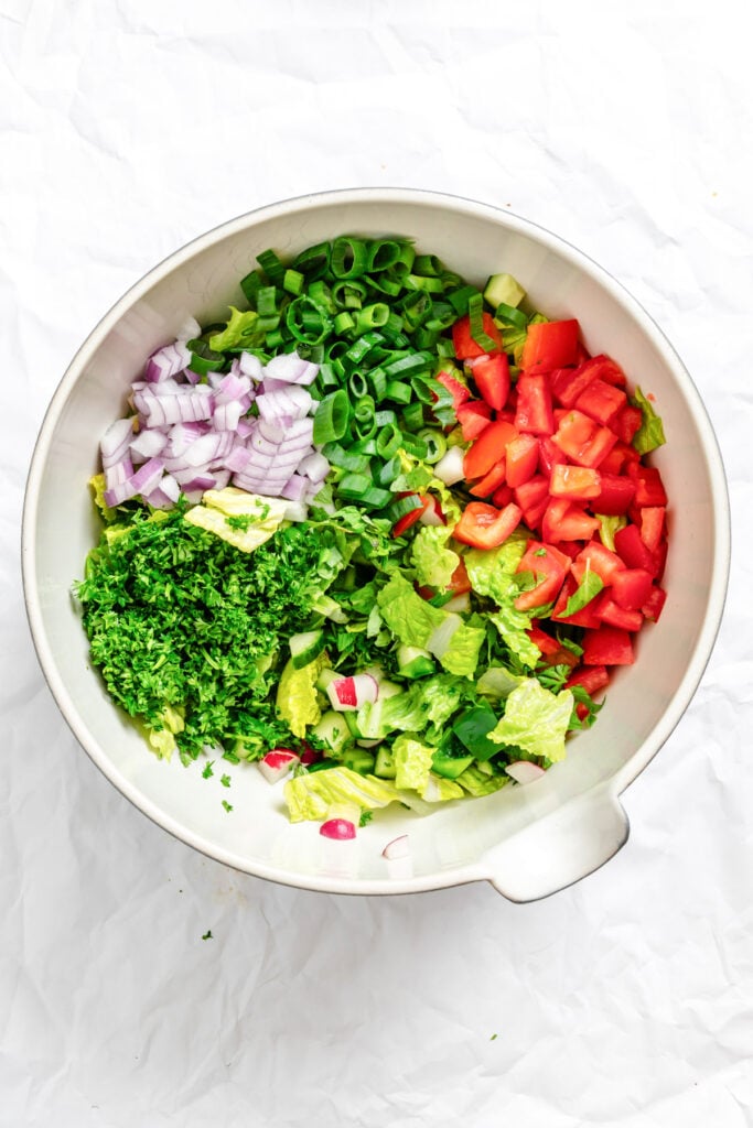Fattoush Salad ingredients in a bowl