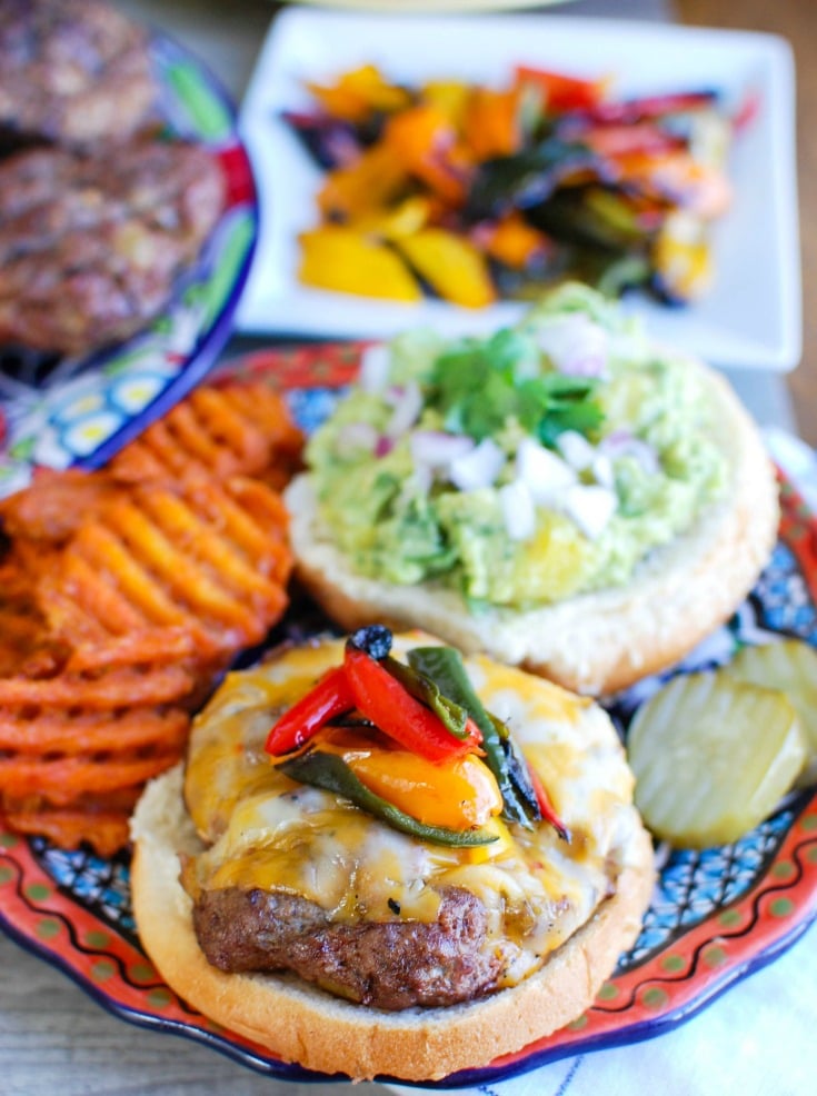 This Southwestern Hamburger with Sweet Guacamole is sure to be a hit at your next backyard party this summer. Southwestern flavors are added to hamburgers and paired with a sweet guacamole of avocados and pineapple. These are a true crowd pleaser!