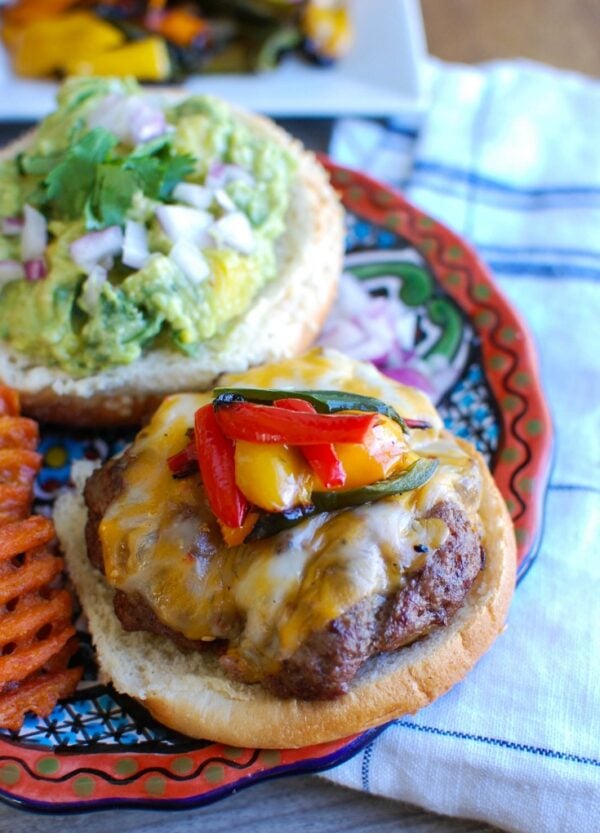 This Southwestern Hamburger with Sweet Guacamole is sure to be a hit at your next backyard party this summer. Southwestern flavors are added to hamburgers and paired with a sweet guacamole of avocados and pineapple. These are a true crowd pleaser!