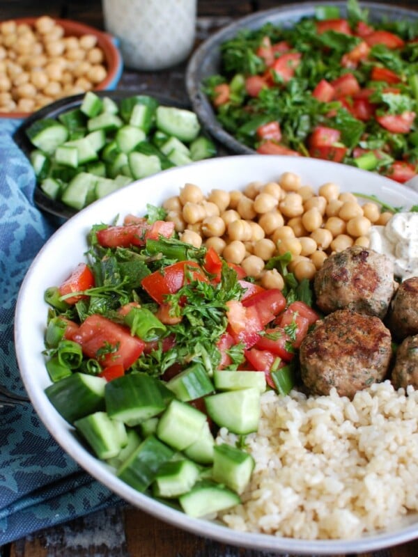 Mediterranean Baked Turkey Meatballs with a spoon.