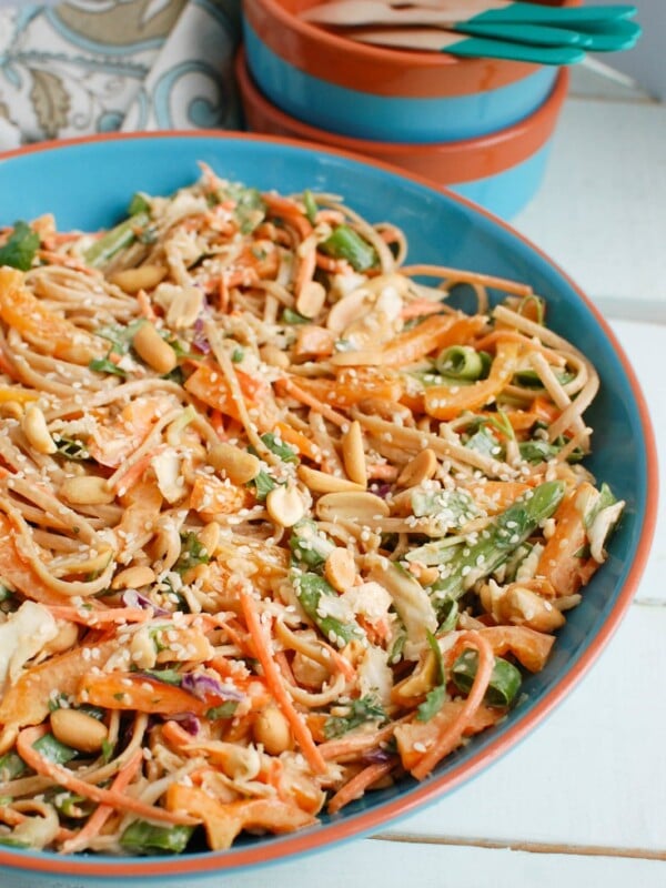 Asian Vegetable Noodle Salad with Spicy Peanut Sauce is a vegetable packed pasta salad that is the perfect summer dish. This salad has a little kick to it and is very customizable to your guests tastes! 