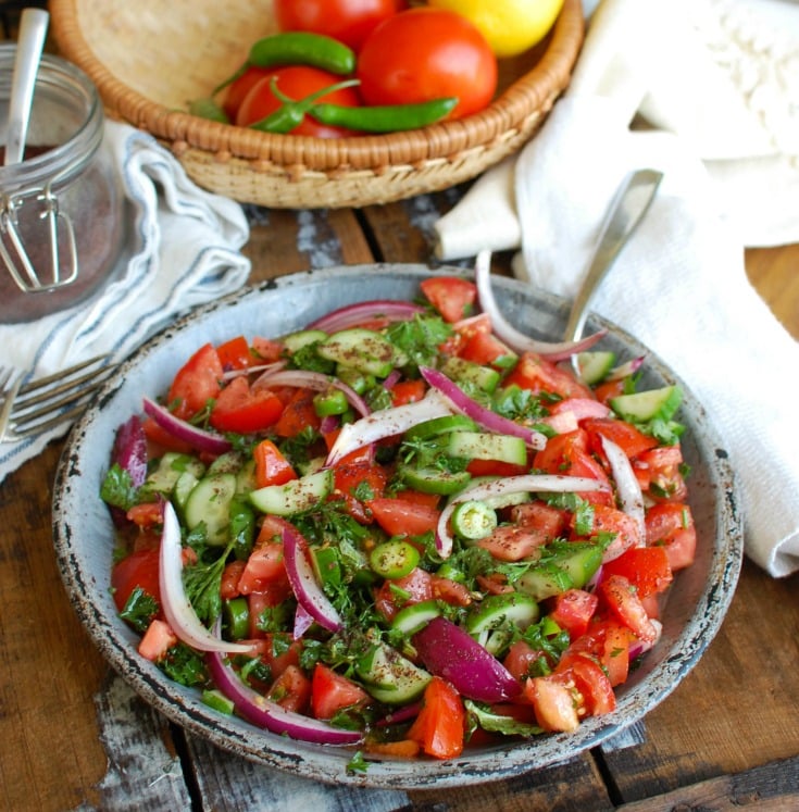 Persian Tomato Cucumber Salad in blue bowl 