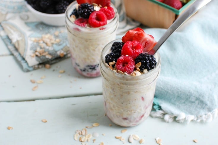 Overnight Triple Berry Oatmeal is a protein and calcium packed breakfast that is perfect for back-to-school or an on-the go snack. Oats are soaked overnight with milk and Greek yogurt and paired with three berries: blueberries, raspberries and strawberries. You can't beat a quick and easy breakfast that also tastes delicious! 