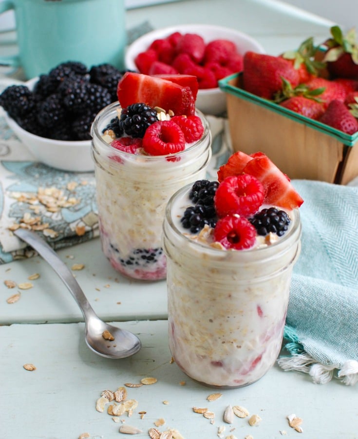 Overnight Triple Berry Oatmeal is a protein and calcium packed breakfast that is perfect for back-to-school or an on-the go snack. Oats are soaked overnight with milk and Greek yogurt and paired with three berries: blueberries, raspberries and strawberries. You can't beat a quick and easy breakfast that also tastes delicious! 