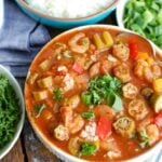 Crock-Pot® Jambalaya Soup is rich with flavor and spice and packed with delicious New Orleans flavors. Chicken, andouille sausage and shrimp are simmered in a cajun spiced tomato broth and served with rice. This is comforting and a great meal to share with others!
