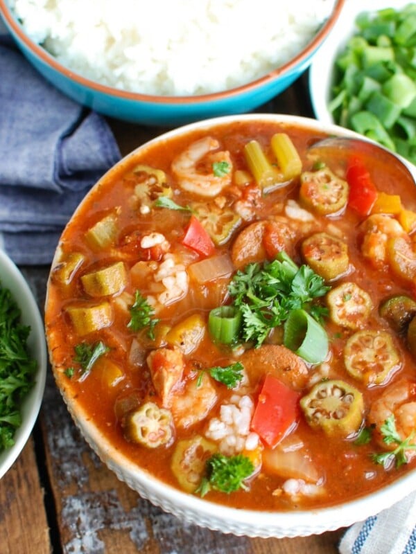 Crock-Pot® Jambalaya Soup is rich with flavor and spice and packed with delicious New Orleans flavors. Chicken, andouille sausage and shrimp are simmered in a cajun spiced tomato broth and served with rice. This is comforting and a great meal to share with others!
