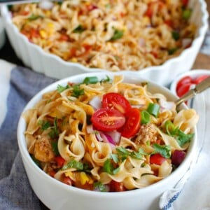 Easy Mexican Noodle Casserole makes weeknight meals easy, fun and festive with a colorful casserole packed with No Yolk Noodles,  colorful vegetables, ground turkey, spices and cheese. This dish will quickly become a family favorite. 