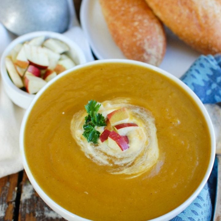 Slow Cooker Butternut Squash Apple Soup is a creamy fall soup that will warm you up. Butternut squash, apples and spices simmer in the crockpot to create an easy meal that is healthy and makes a nice lunch or addition to a dinner. 
