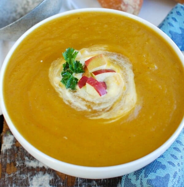 Slow Cooker Butternut Squash Apple Soup with parsley.