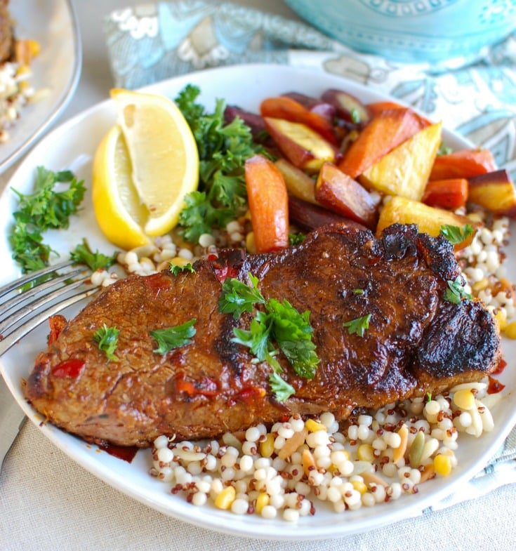 Pan Seared Harissa New York Strip Steak will spice up your next date night or family meal. Juicy, flavorful New York strip steaks are marinaded with harissa paste, spices and garlic and pan seared to perfection. Pair this with a side of your favorite roasted vegetable and couscous. 