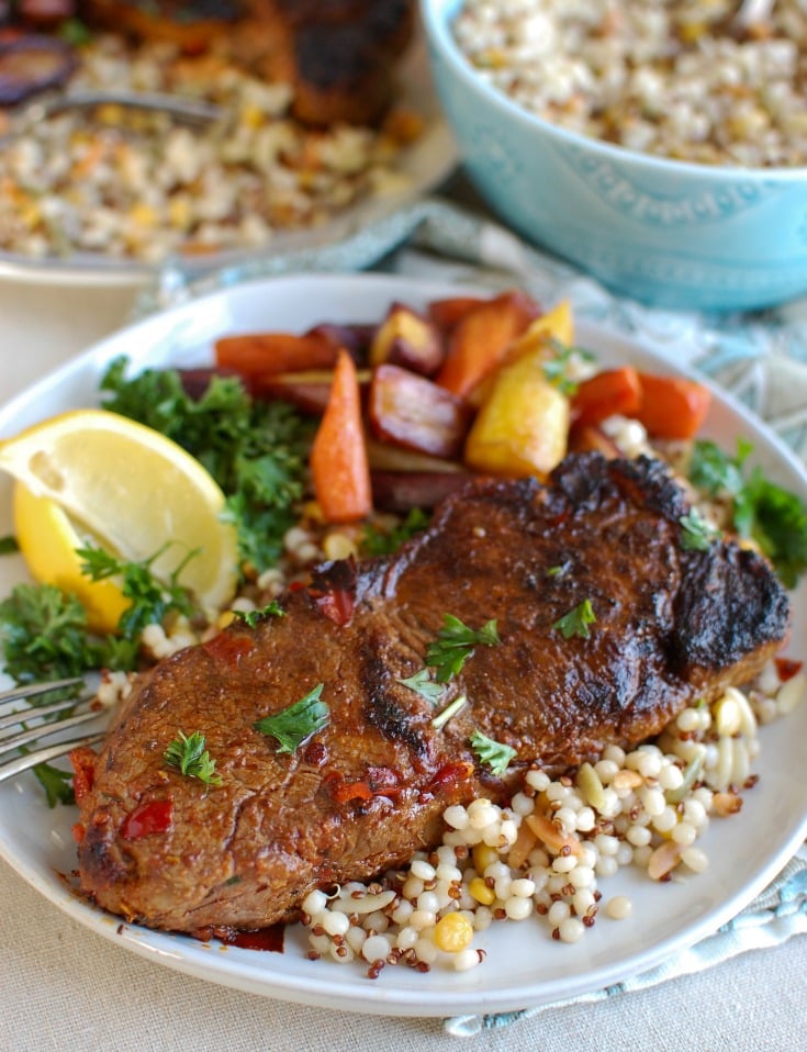 Pan Seared Harissa New York Strip Steak will spice up your next date night or family meal. Juicy, flavorful New York strip steaks are marinaded with harissa paste, spices and garlic and pan seared to perfection. Pair this with a side of your favorite roasted vegetable and couscous. 