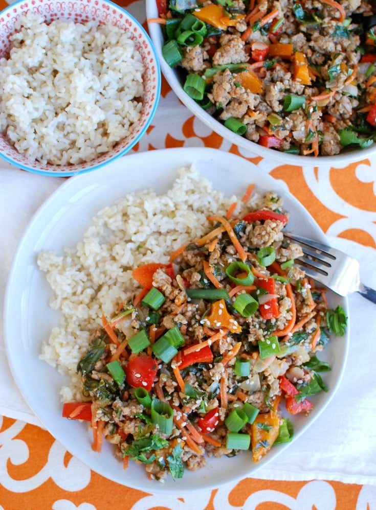 Easy Thai Pork Stir-Fry is a quick meal packed with your favorite Thai flavors. Ground pork is sautéed along with bell peppers, carrots and bok choy along with a sauce that is both spicy and sweet. This stir-fry works nicely with rice, noodles or in lettuce wraps. 