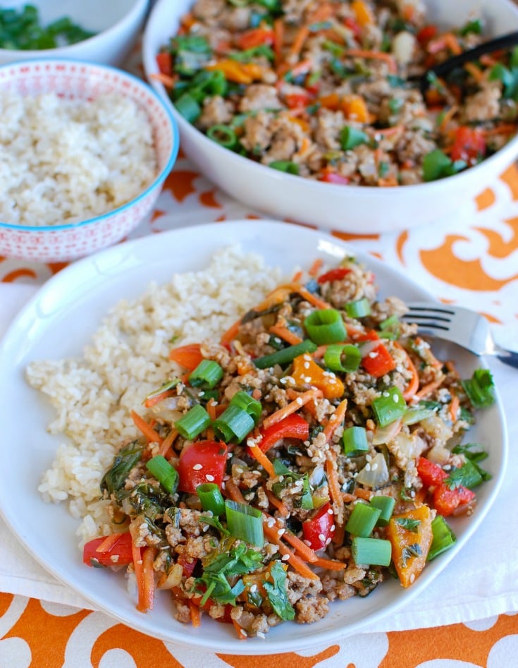 Easy Thai Pork Stir-Fry is a quick meal packed with your favorite Thai flavors. Ground pork is sautéed along with bell peppers, carrots and bok choy along with a sauce that is both spicy and sweet. This stir-fry works nicely with rice, noodles or in lettuce wraps. 