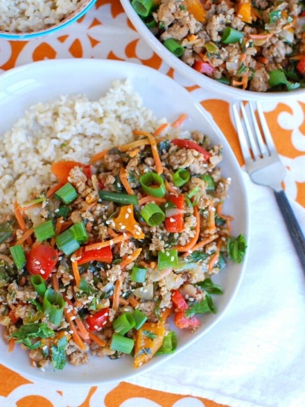 Easy Thai Pork Stir-Fry is a quick meal packed with your favorite Thai flavors. Ground pork is sautéed along with bell peppers, carrots and bok choy along with a sauce that is both spicy and sweet. This stir-fry works nicely with rice, noodles or in lettuce wraps. 