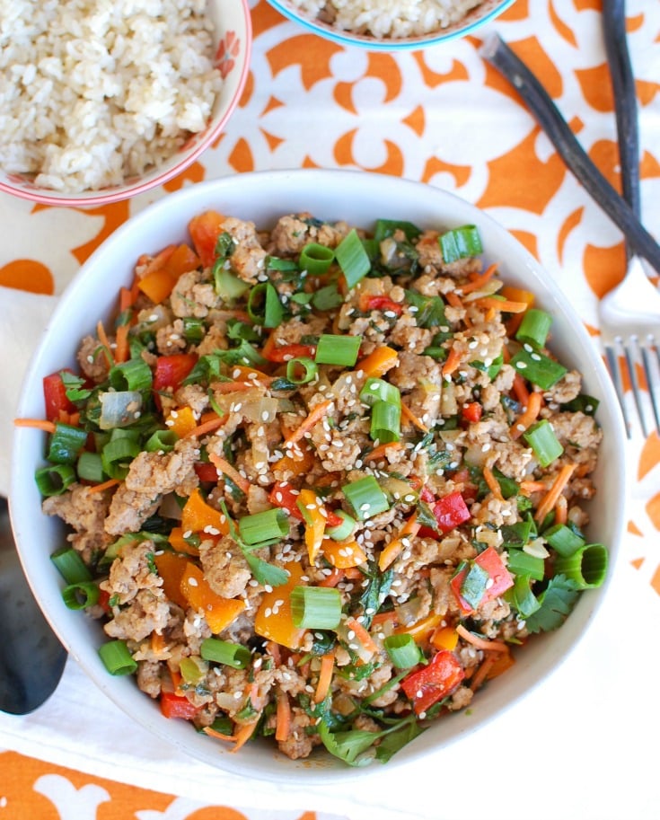 Easy Thai Pork Stir-Fry is a quick meal packed with your favorite Thai flavors. Ground pork is sautéed along with bell peppers, carrots and bok choy along with a sauce that is both spicy and sweet. This stir-fry works nicely with rice, noodles or in lettuce wraps. 
