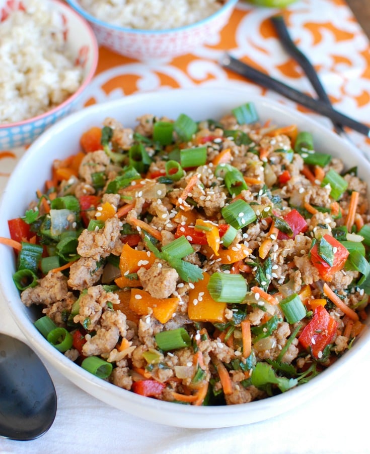 Easy Thai Pork Stir-Fry is a quick meal packed with your favorite Thai flavors. Ground pork is sautéed along with bell peppers, carrots and bok choy along with a sauce that is both spicy and sweet. This stir-fry works nicely with rice, noodles or in lettuce wraps. 