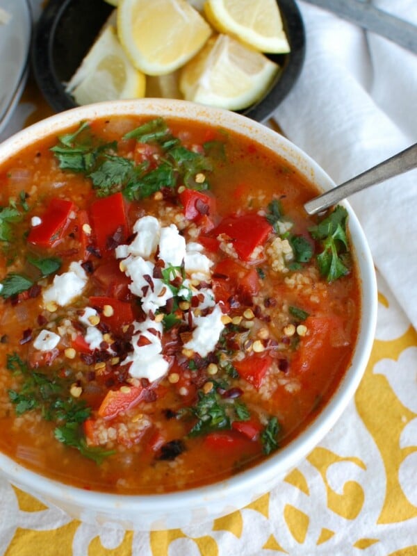 Tomato Red Pepper Bulgur Soup with spoon.