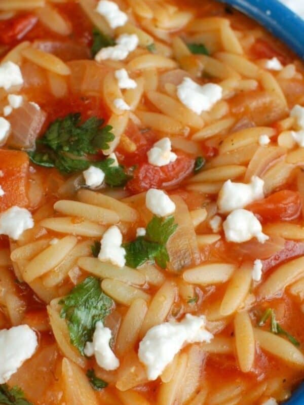 One Pot Creamy Tomato Herb Orzo in a blue bowl