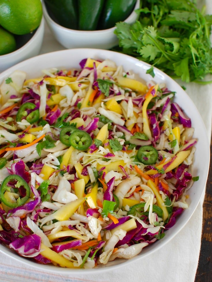 Easy Mango Cabbage Coleslaw in white bowl 