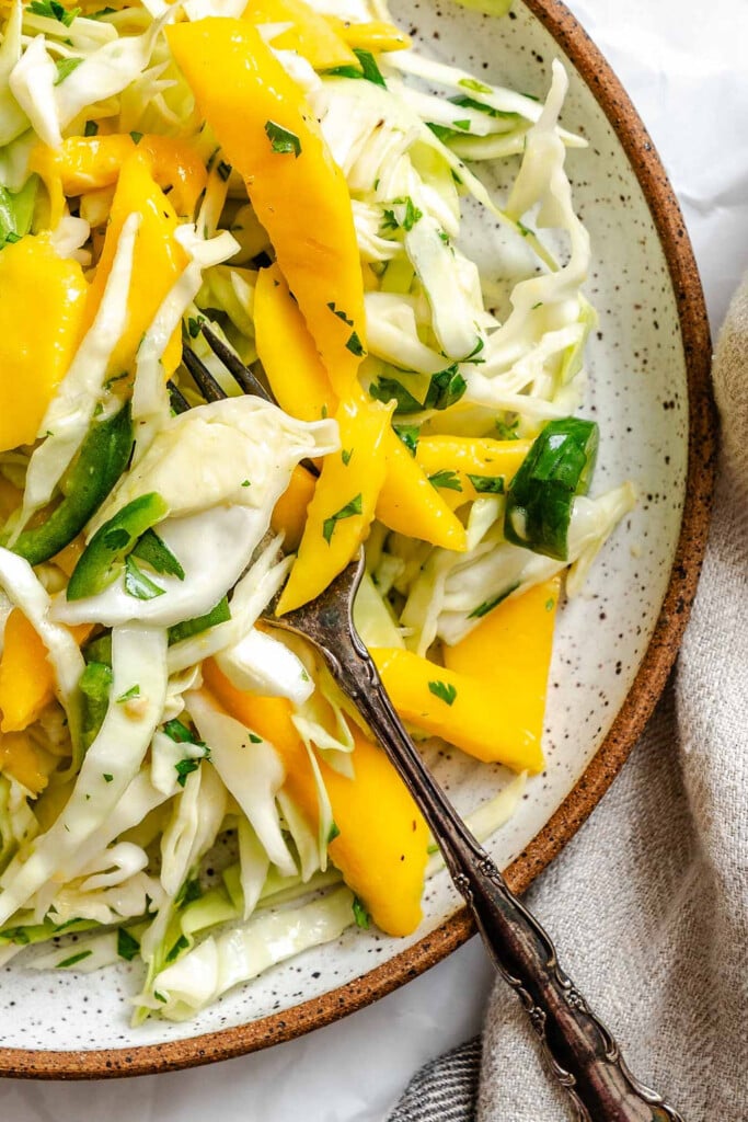 Easy Mango Cabbage Coleslaw with fork 
