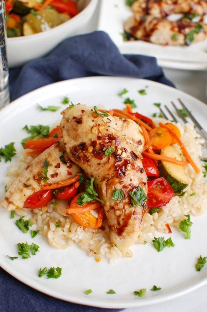 Sheet Pan Honey Balsamic Chicken Tenders and Vegetables White Plate