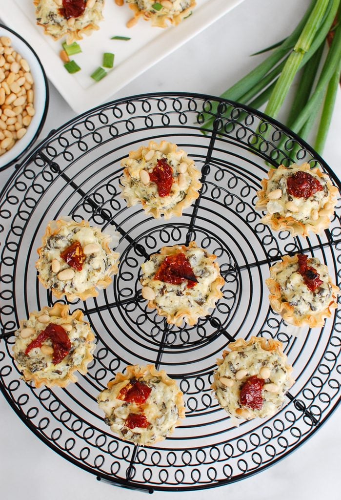 Spinach Artichoke Sun-dried Tomato Phyllo Bites Above Wire Rack 