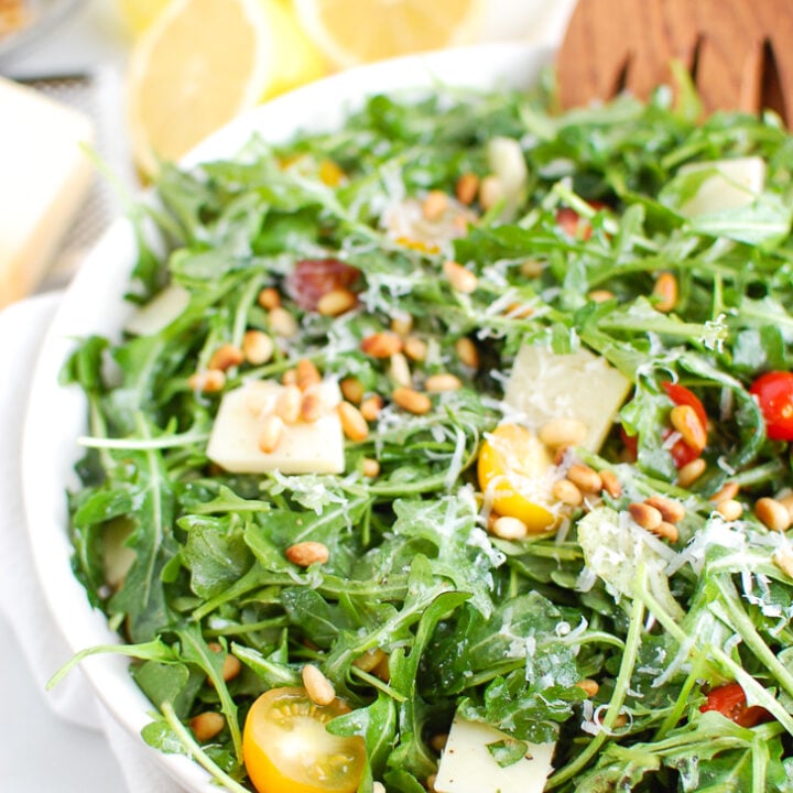 Lemon Arugula Salad with Pine Nuts White Bowl