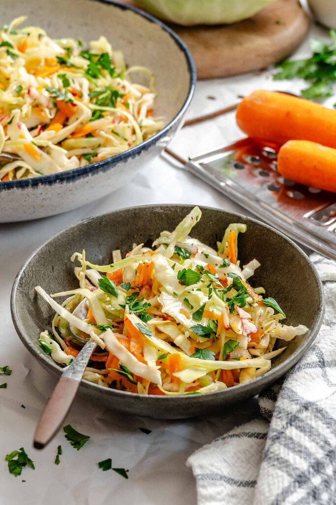 Healthy Coleslaw in dark bowl 