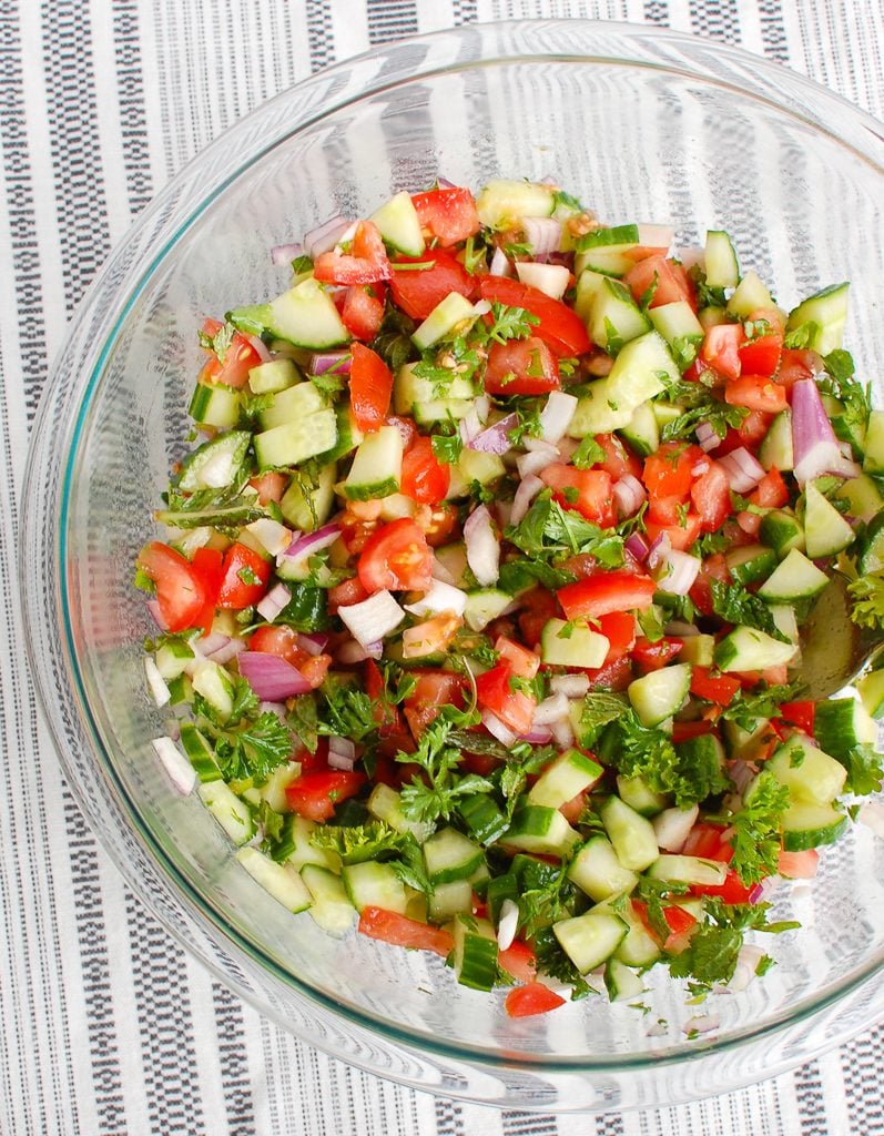 Israeli Salad Mixed Ingredients in Clear Bowl