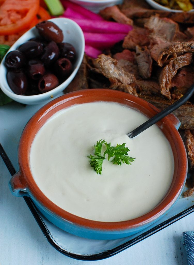 Tahini Sauce in teal dish