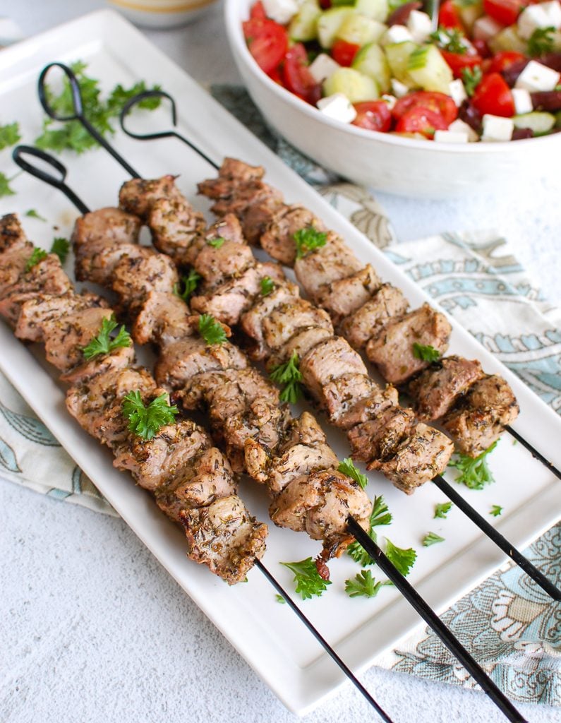 Pork Souvlaki with Tzatziki on a platter 