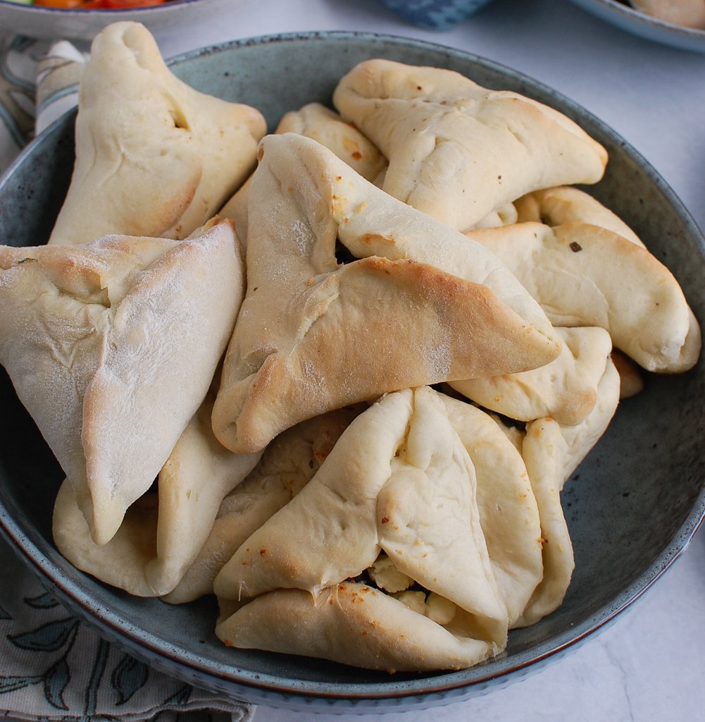 dough stuffed with spinach and cheese and baked into triangles.