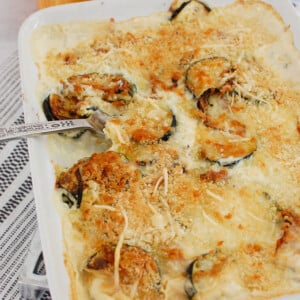 Zucchini Gratin in white casserole dish