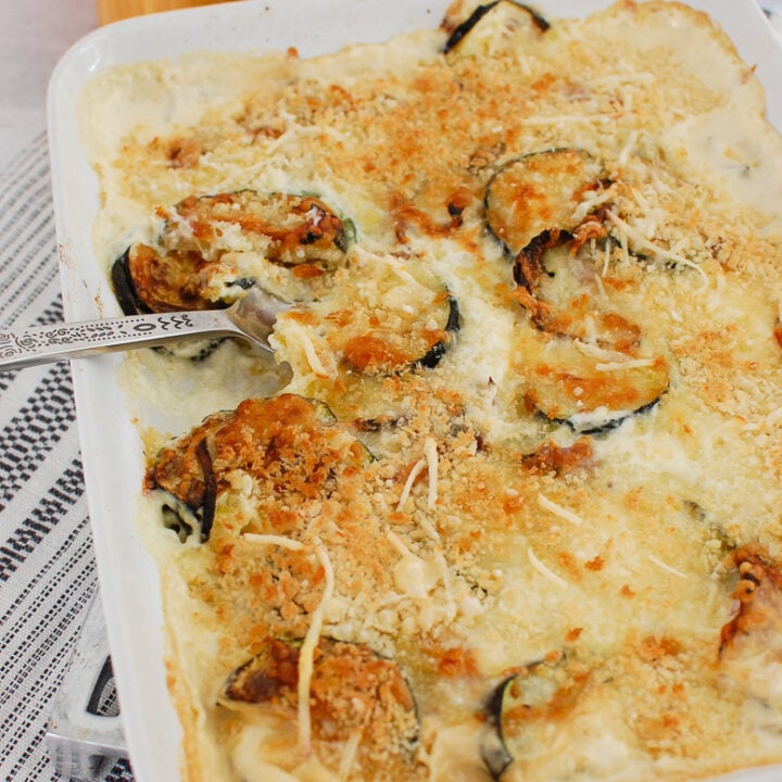 Zucchini Gratin in white casserole dish